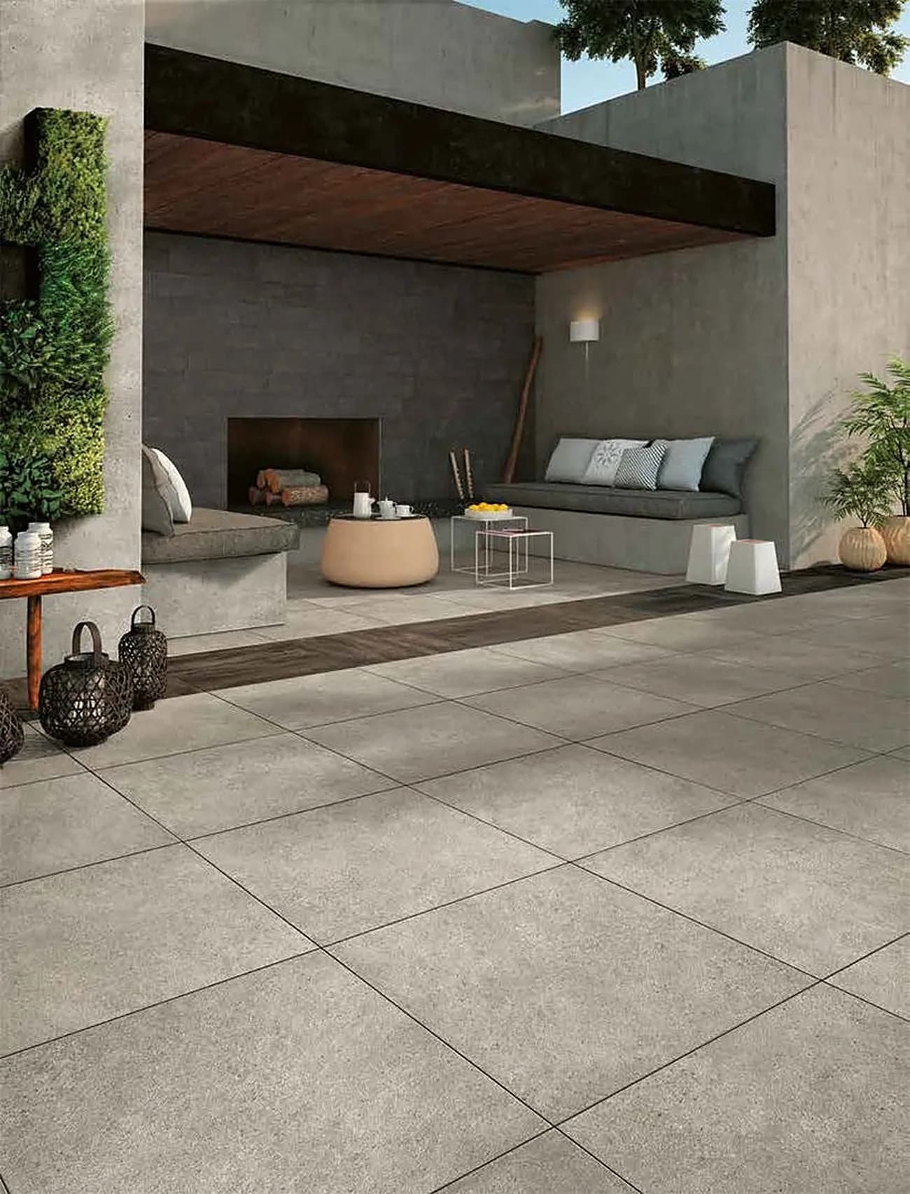 Varanda externa com piso de concreto em grandes placas